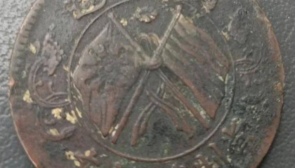 清理墓穴发现的湖南省造双旗币，知道价值后，直呼：显灵了